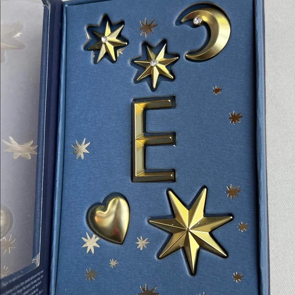 Anthropologie Gold Star and Moon Candle Charms